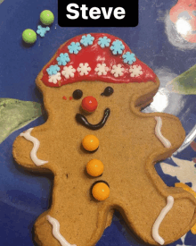 a gingerbread man with the name steve on the bottom