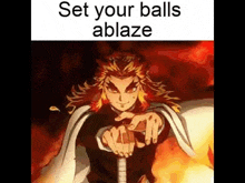 a man is holding a sword in front of a fire and says `` set your balls abblaze '' .