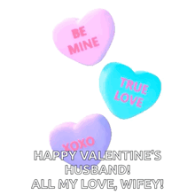 three candy hearts that say be mine true love and xoxo on them