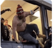 a shirtless man wearing a chiefs hat is jumping over a window