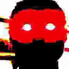 a pixelated image of a person 's face with red eyes