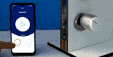 a phone displaying a lock screen next to a lock