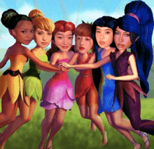 a group of fairies are posing for a picture