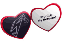 a heart shaped mirror that says stealth my beloved on it