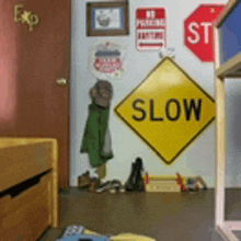 a child 's room with a yellow sign that says slow