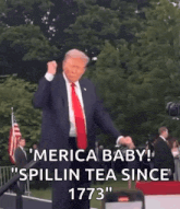 a man in a suit and tie is dancing in front of a microphone and says merica baby !
