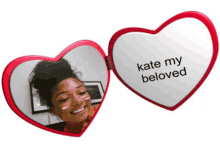 a heart shaped mirror says kate my beloved on it