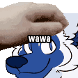 a person is putting a sticker on a blue and white furry animal 's face .