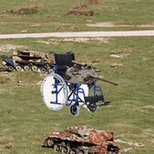 a wheelchair with a tank on top of it flying in the air