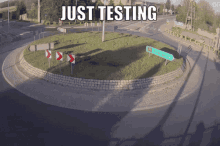 a roundabout with the words just testing on the bottom