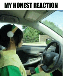 a woman is driving a car with the words " my honest reaction " on the bottom