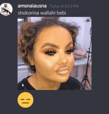 a screenshot of a woman 's face with a smiley face next to it that says amsnaiausna today at 6:03 pm