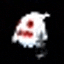 a pixelated image of a ghost with red eyes and red mouth .