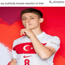 a man in a turkey jersey with the number 8 on it