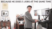 because he does 5 jobs at the same time is written above a man standing in front of a computer