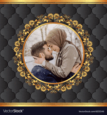 a picture of a man and woman kissing in a gold frame