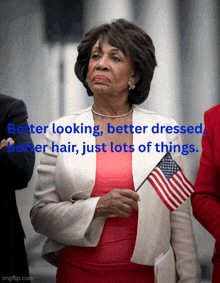 a woman holding an american flag with the words better looking better dressed better hair just lots of things behind her