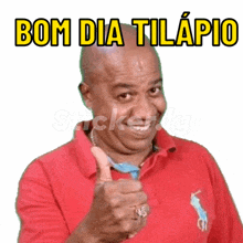 a man in a red shirt giving a thumbs up with the words bom dia tilapio below him