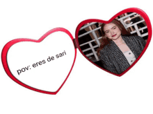 a red heart shaped mirror with a picture of a woman and the words pov eres de sari