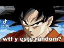 a close up of a dragon ball z character with the words `` wtf y este random '' .