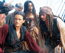 a group of pirates including captain jack sparrow and a woman