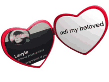 a heart shaped mirror says " adi my beloved "