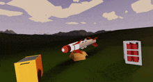 a rocket is sitting on top of a box in a field