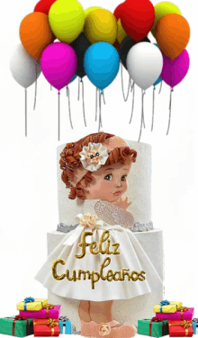 a little girl in a white dress with feliz cumpleanos written on the front