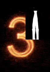 a silhouette of a person standing in front of a glowing light