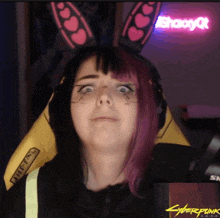 a woman with bunny ears is playing cyberpunk