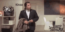 a man in a suit is standing in a room with the name kenza on the top