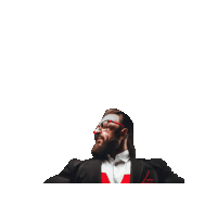 a man with a beard and red glasses is wearing a suit