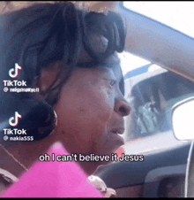 a woman in a car says oh i can n't believe it jesus