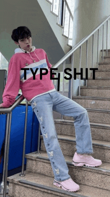 a man in a pink hoodie is sitting on a set of stairs with the words type shit written above him