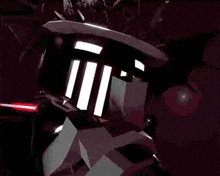 a close up of a person 's face with a helmet on a dark background .