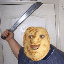 a man wearing a pancake mask is holding a knife over his head