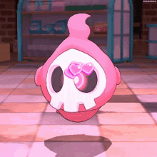 a pink cartoon character with a skull face and hearts in its eyes is standing on a tiled floor