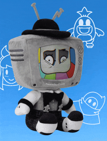 a stuffed toy that looks like a television with a sad face on it