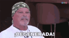 a man wearing a bandana says degenerada in spanish