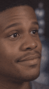 a close up of a man 's face with sora written below it
