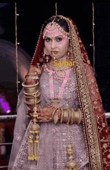 a woman in a wedding dress with the name samar written on the bottom