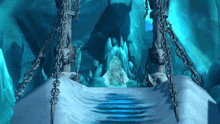 an ice cave with chains hanging from the pillars and stairs