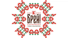 a red and green geometric design with the word breui in the center