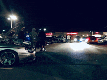 a group of people are gathered in front of a target store