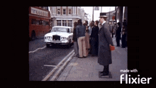 a man in a top hat is standing on a sidewalk in front of a white car made with flixier