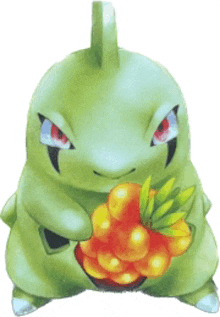 a green monster with red eyes is holding a bunch of fruit