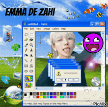 a computer screen with a girl sticking her tongue out and the words emma de zahi on top