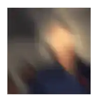 a blurry picture of a person 's face with a light shining through it
