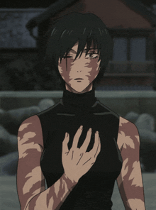 a woman in a black turtleneck holds her hand to her chest