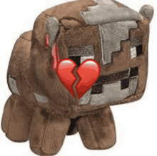 a stuffed animal with a broken heart on its chest .